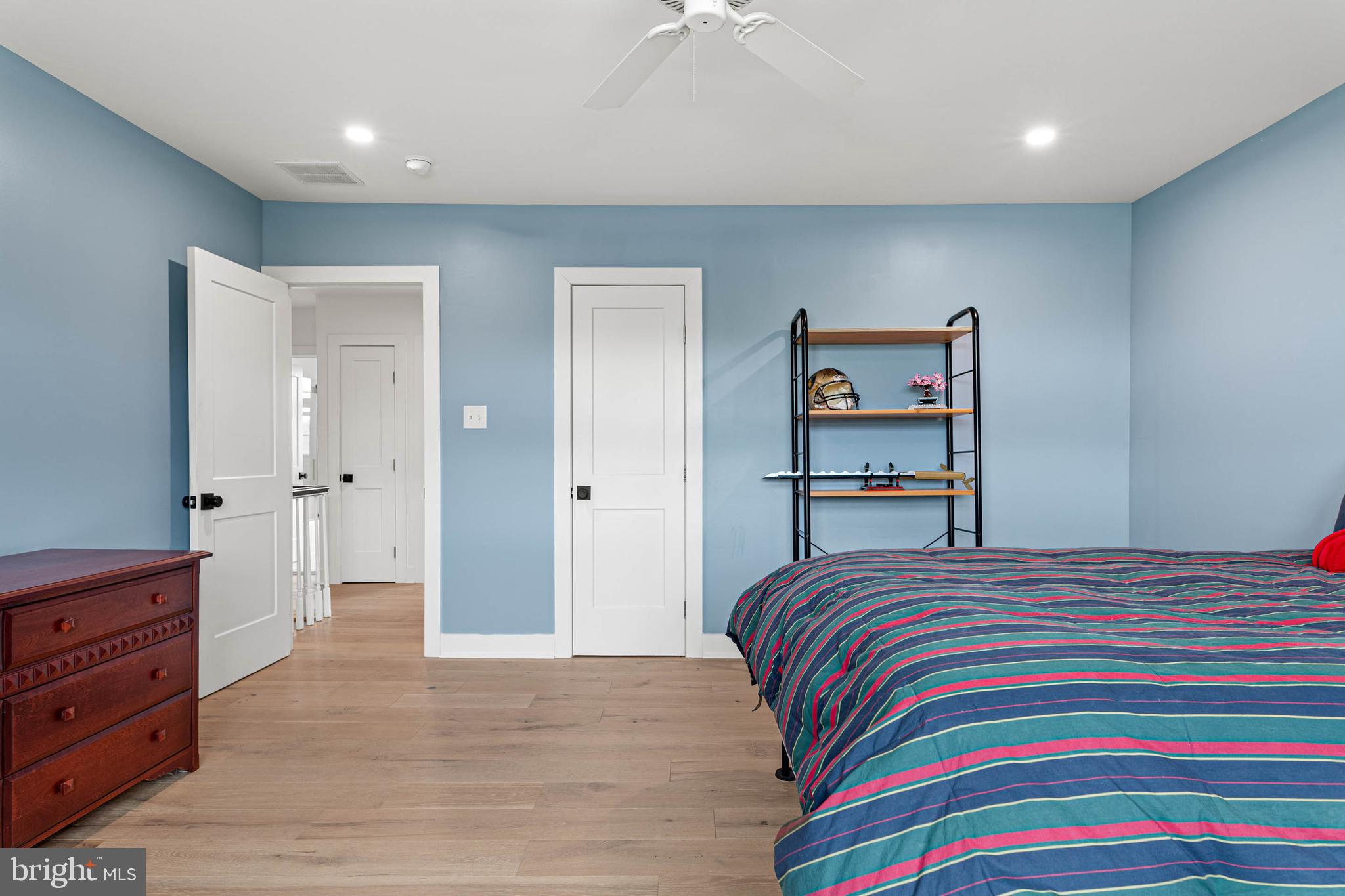 22 Russell Place Ambler, PA 19002 - Photo 46 of 65 a bedroom with a bed and a dresser