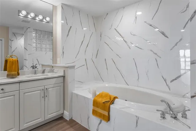 a kitchen with refrigerator and window