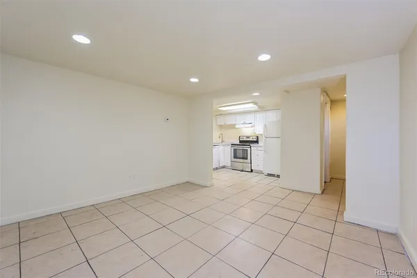 a view of an empty room and window
