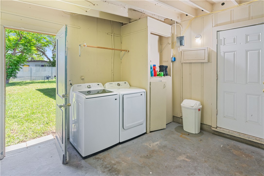 4846 Kasper Street Corpus Christi, TX 78415 - Photo 18 of 20 a view of storage room with washer and dryer