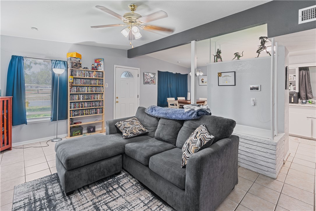 4846 Kasper Street Corpus Christi, TX 78415 - Photo 4 of 20 a living room with furniture and wooden floor