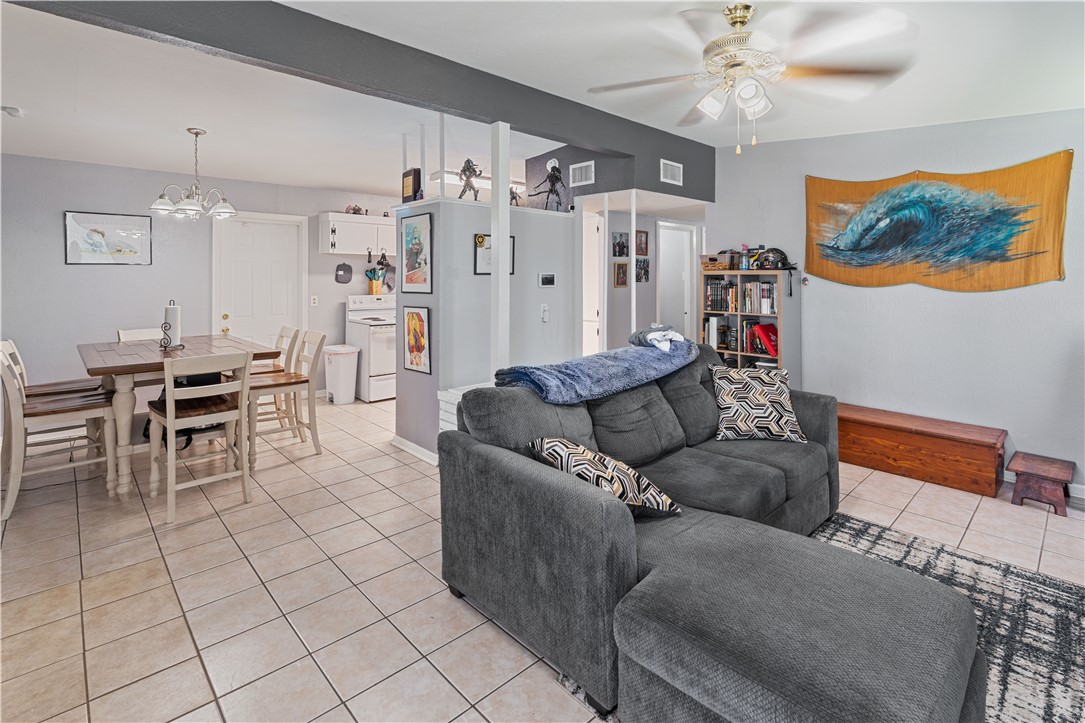 4846 Kasper Street Corpus Christi, TX 78415 - Photo 5 of 20 a living room with furniture and kitchen view