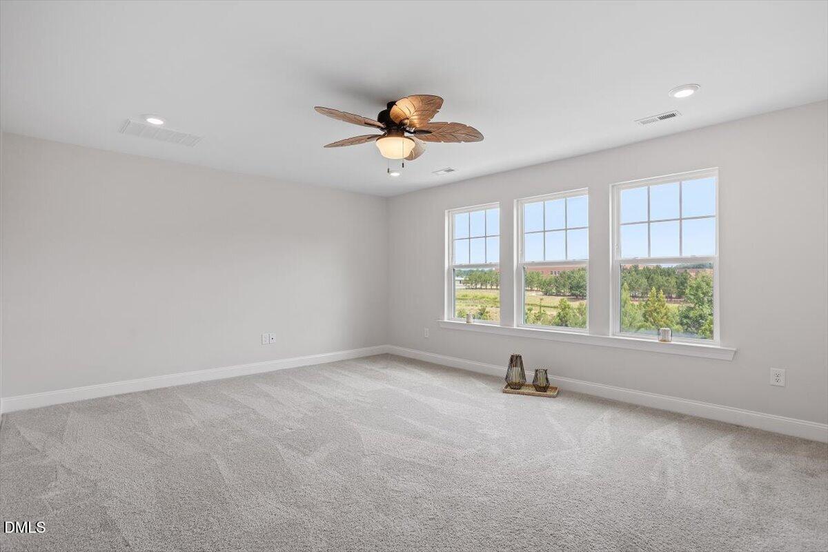 402 Ressler Street Holly Springs, NC 27540 - Photo 27 of 48 Primary Bedroom