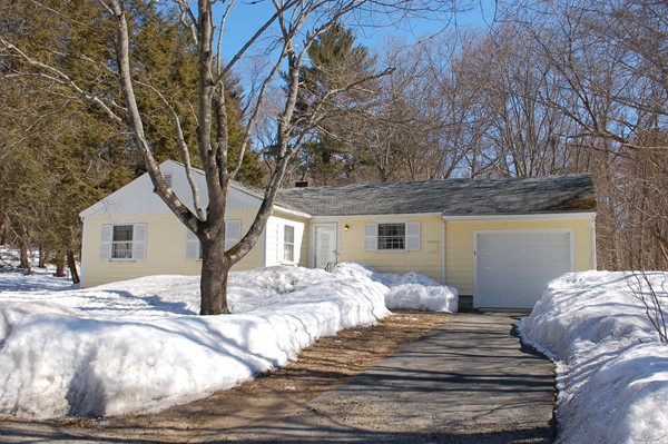 1 Cedarview Road Ipswich, MA 01938 - Photo 1 of 13 a front view of a house with a yard