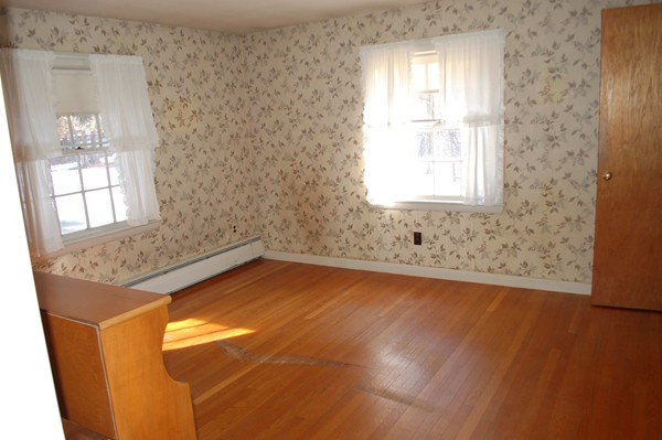 1 Cedarview Road Ipswich, MA 01938 - Photo 6 of 13 an empty room with a window
