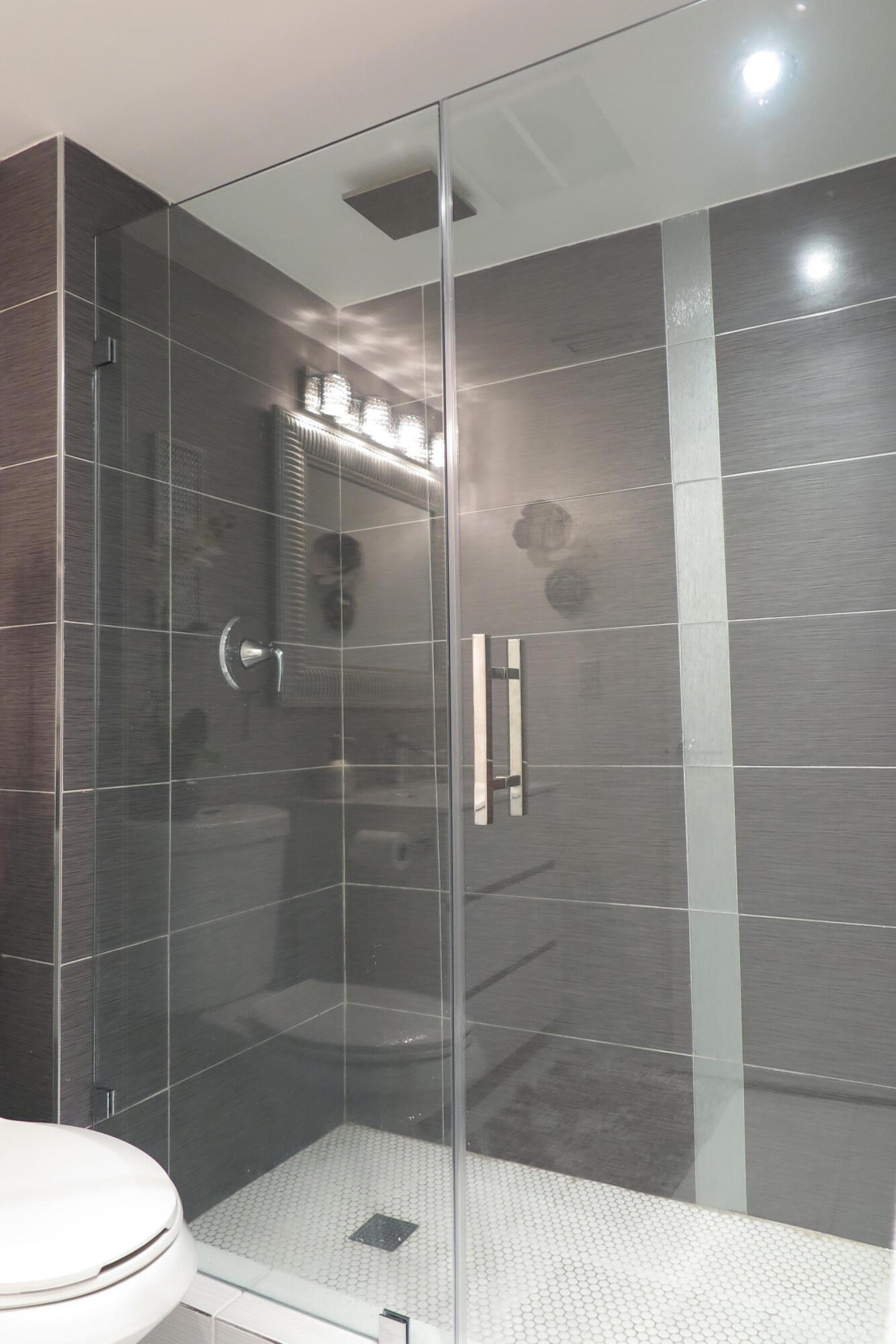 7875 La Mirada Drive Boca Raton, FL 33433 - Photo 20 of 31 a bathroom with a shower