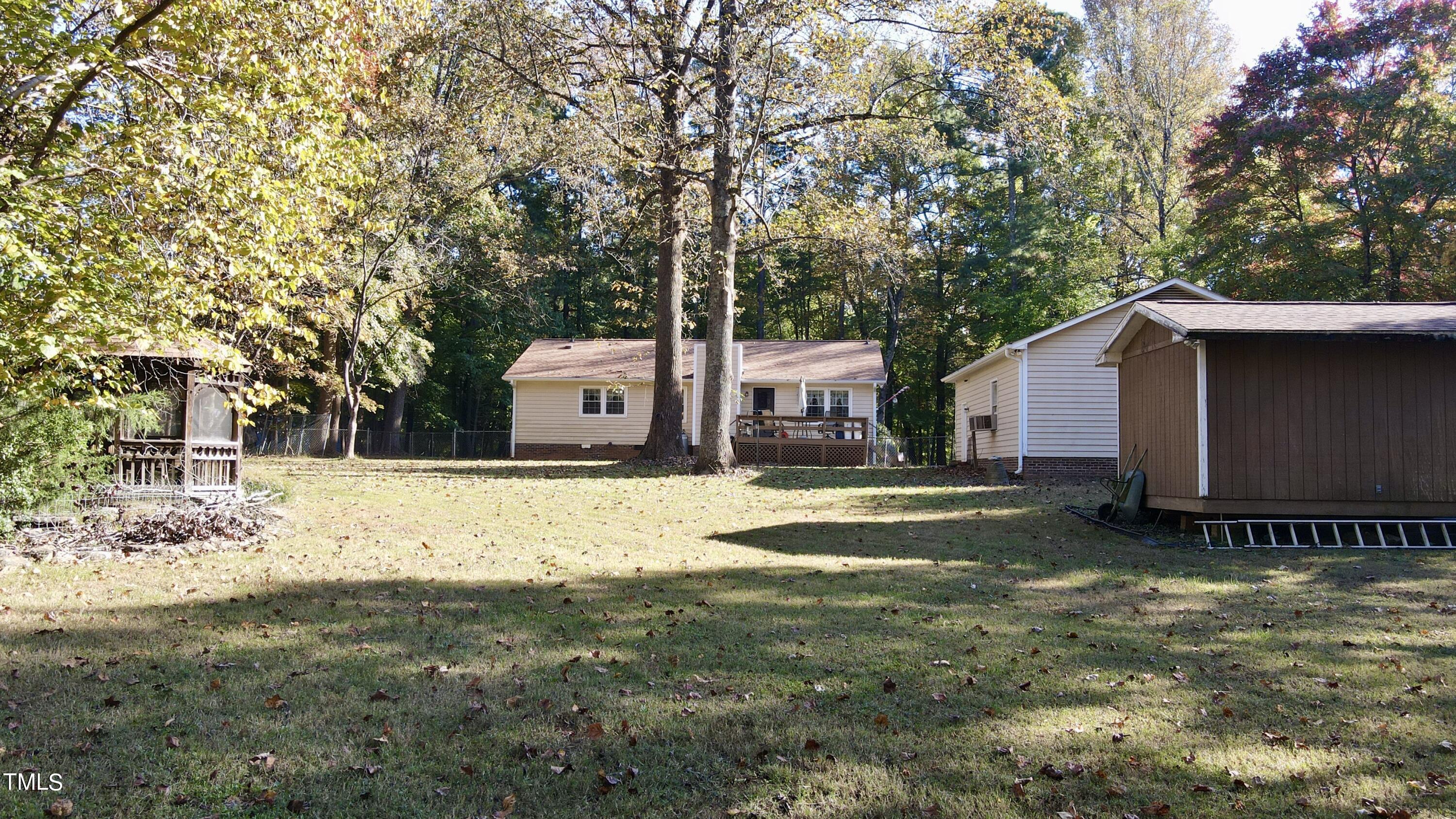 1123 Dove Ridge Road Bahama, NC 27503 - Photo 7 of 28 Backyard/Facing Rear of House
