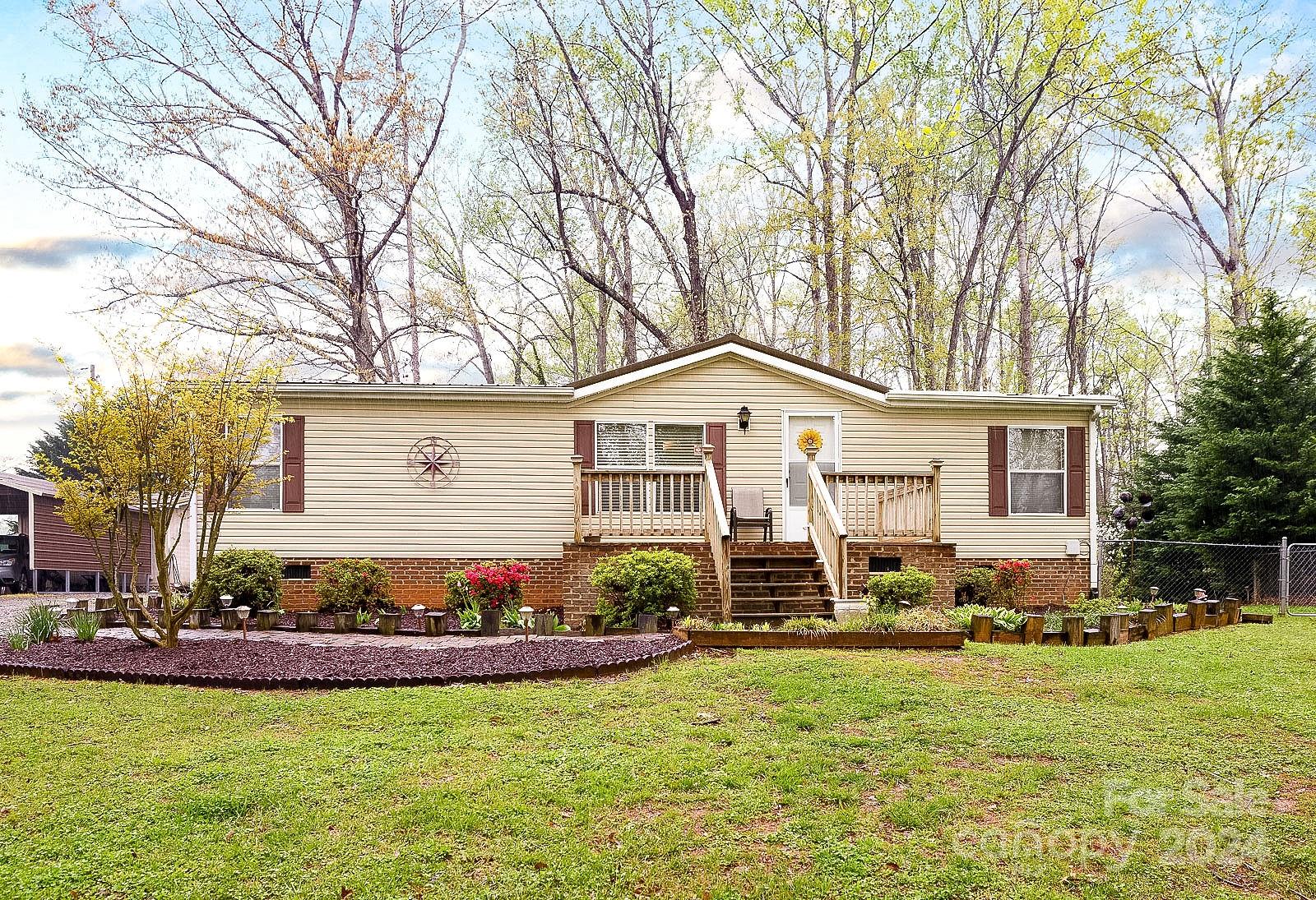 740 Childers Road Cleveland, NC 27013 - Photo 14 of 24 a view of a house with backyard and sitting area