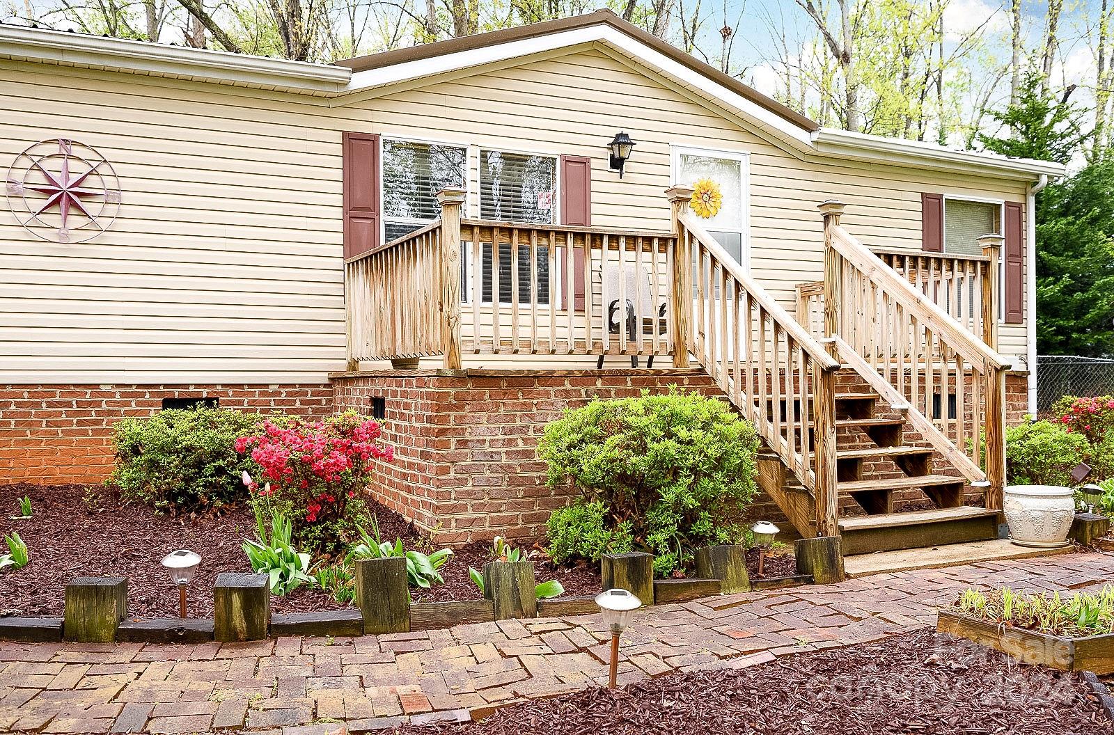 740 Childers Road Cleveland, NC 27013 - Photo 15 of 24 a front view of a house with a yard