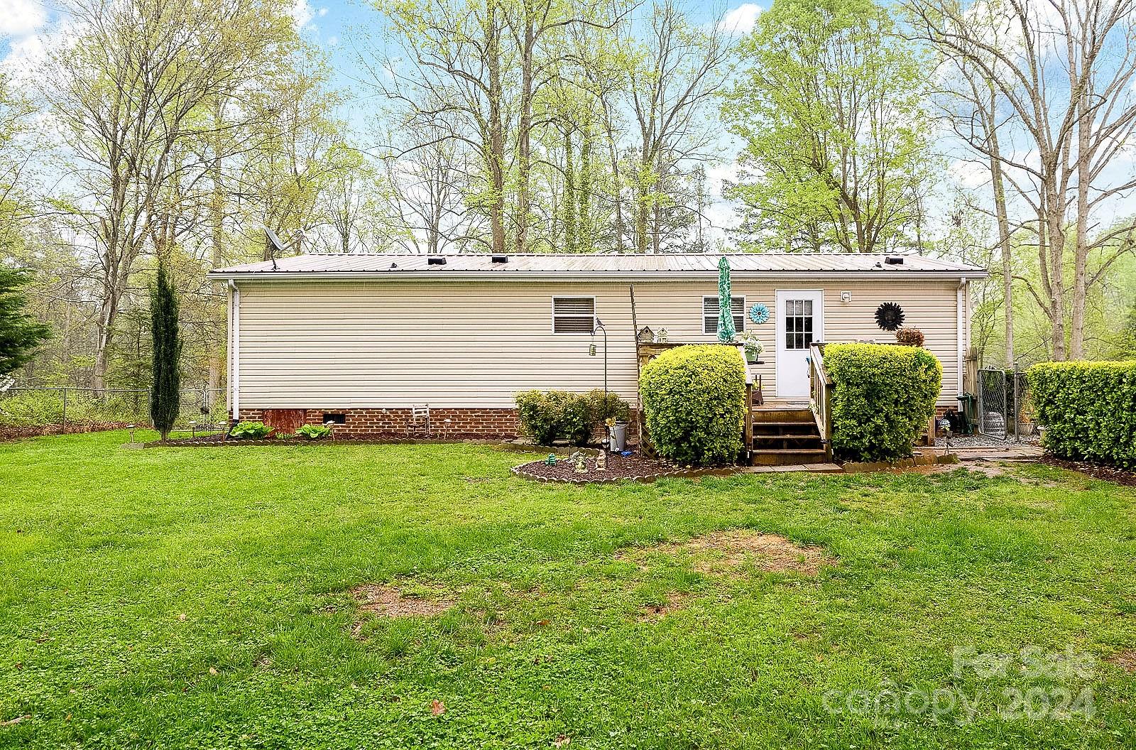 740 Childers Road Cleveland, NC 27013 - Photo 18 of 24 front view of a house with a yard