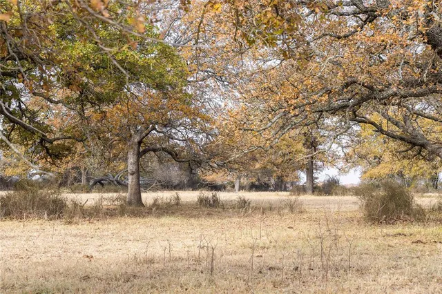 a view of outdoor space with a lake view