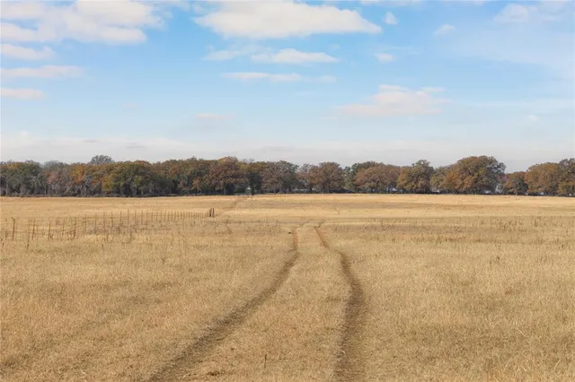 a view of outside space and a lake view