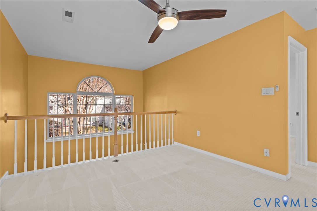 6106 Lookout Point Circle Midlothian, VA 23112 - Photo 17 of 42 a view of a hallway with a large window