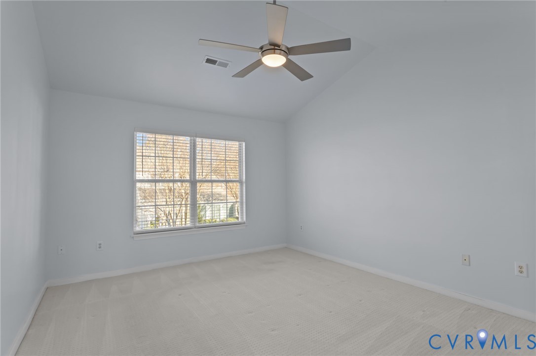6106 Lookout Point Circle Midlothian, VA 23112 - Photo 22 of 42 an empty room with a window and a fan