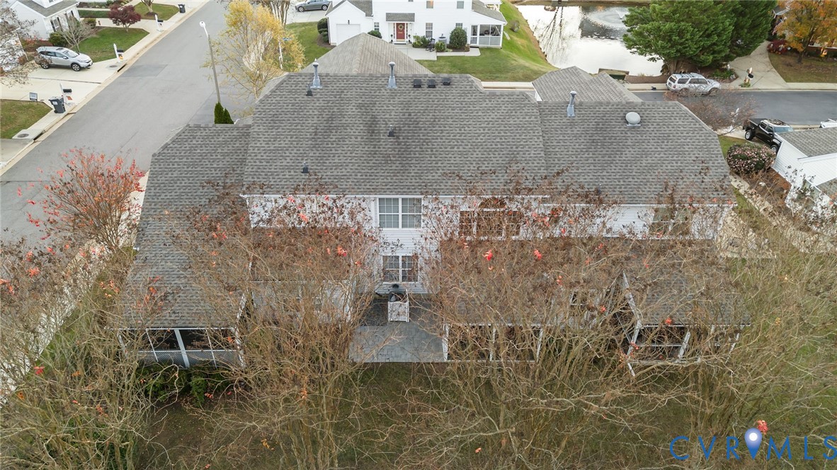 6106 Lookout Point Circle Midlothian, VA 23112 - Photo 36 of 42 view of a brick building next to a yard