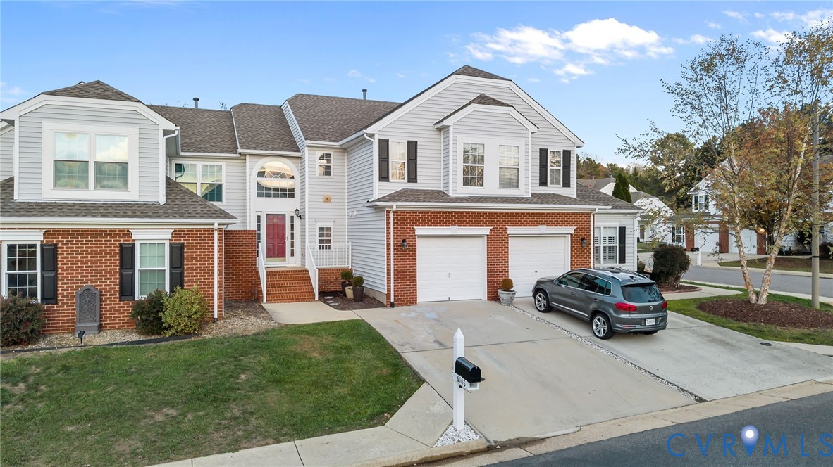 6106 Lookout Point Circle Midlothian, VA 23112 - Photo 42 of 42 a front view of a house with a garden