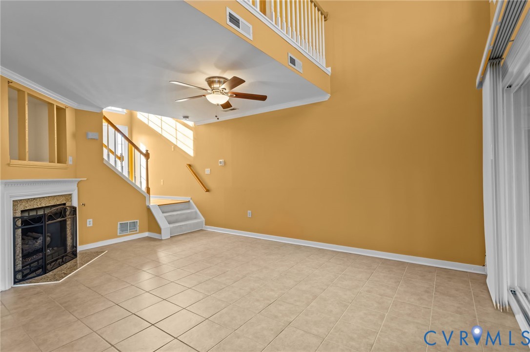 6106 Lookout Point Circle Midlothian, VA 23112 - Photo 7 of 42 a view of an empty room with a fireplace