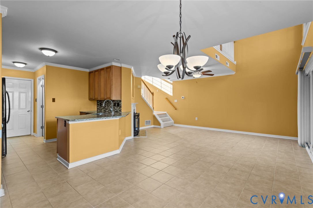 6106 Lookout Point Circle Midlothian, VA 23112 - Photo 10 of 42 a view of kitchen with stainless steel appliances granite countertop living room