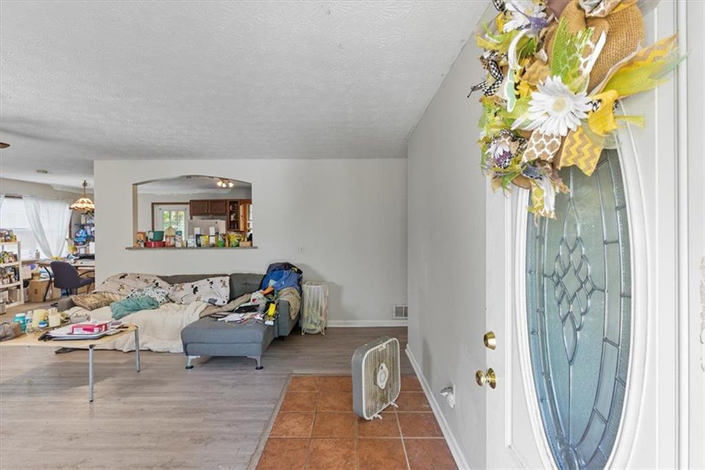 31 Powder Mill Drive Dallas, GA 30157 - Photo 13 of 41 a living room with furniture and a table