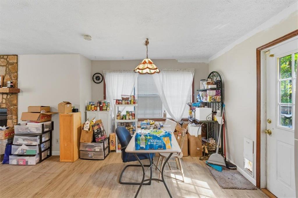 31 Powder Mill Drive Dallas, GA 30157 - Photo 20 of 41 a view of a dining room with furniture window and entryway