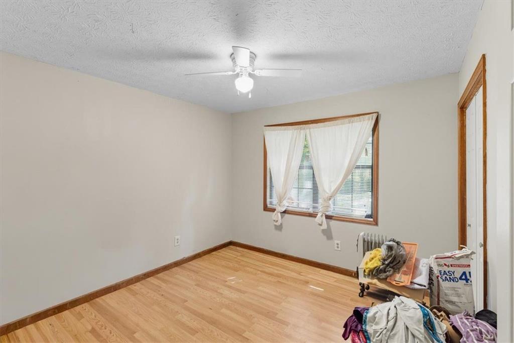 31 Powder Mill Drive Dallas, GA 30157 - Photo 23 of 41 a view of room with wooden floor and fan