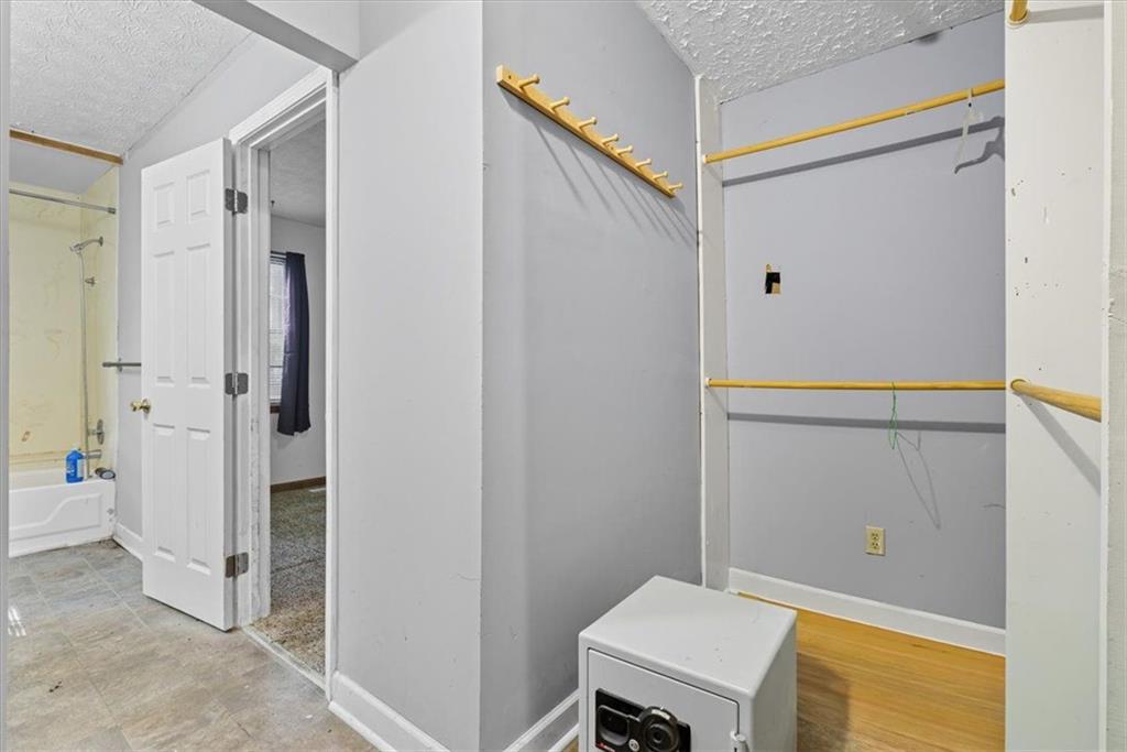 31 Powder Mill Drive Dallas, GA 30157 - Photo 26 of 41 a view of a bathroom with a bathtub