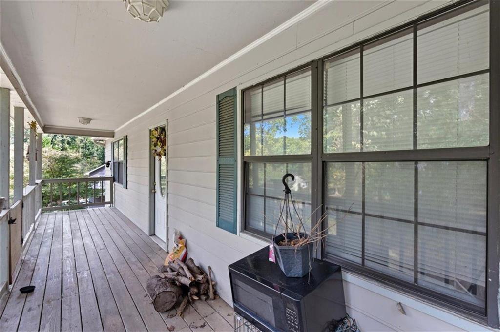 31 Powder Mill Drive Dallas, GA 30157 - Photo 32 of 41 a living room with furniture and a large window