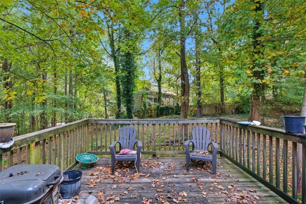 31 Powder Mill Drive Dallas, GA 30157 - Photo 35 of 41 a view of a deck with furniture and a backyard