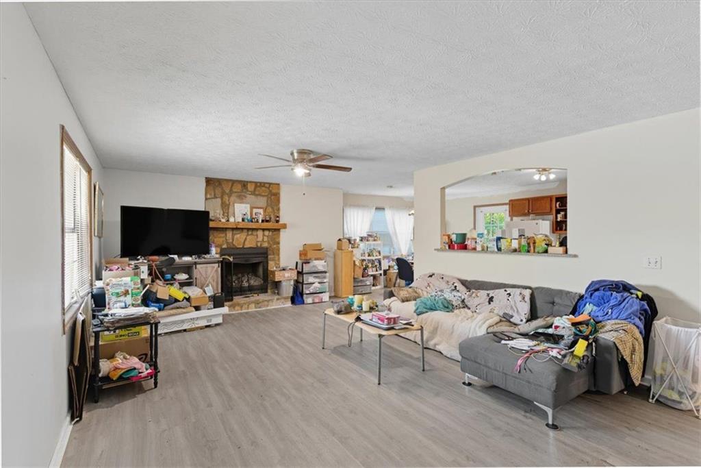 31 Powder Mill Drive Dallas, GA 30157 - Photo 6 of 41 a living room with furniture and a flat screen tv