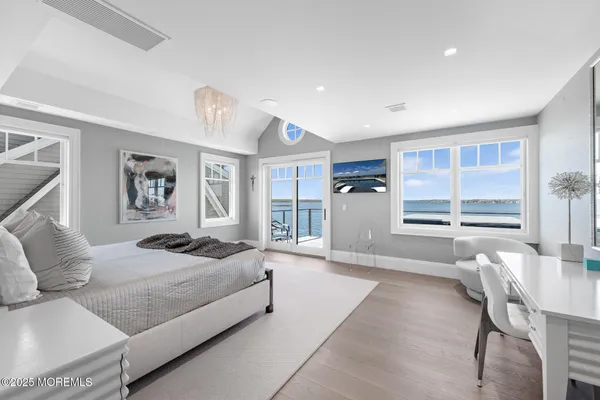 a bathroom with a shower and a glass door