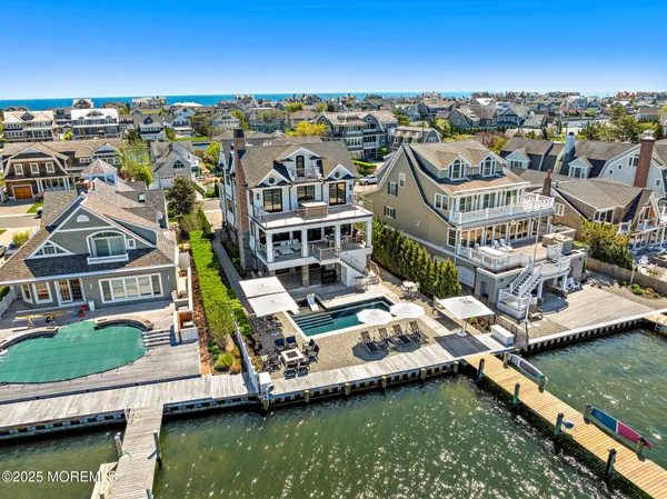 a view of staircase with white walls and a window