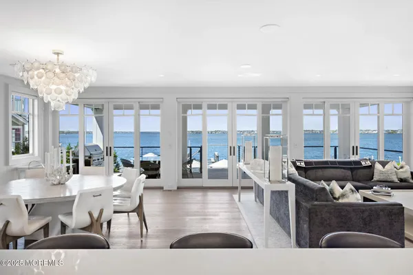 a bathroom with a bathtub a sink and a mirror