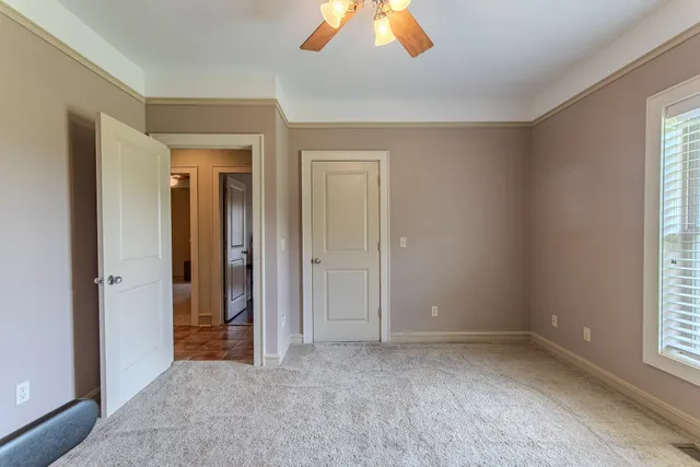 a room with gym equipment and a window