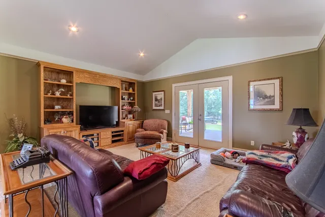 a view of livingroom with furniture and window