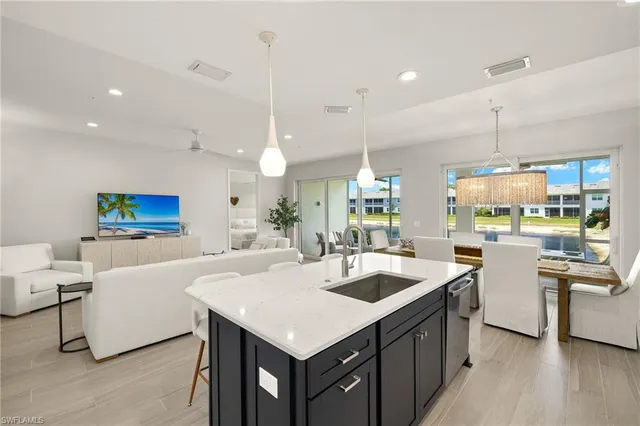 an aerial view of houses with yard