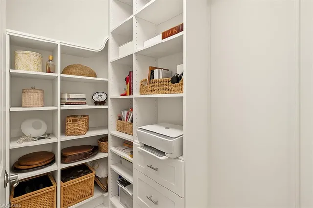 a view of an house with swimming pool and an outdoor seating