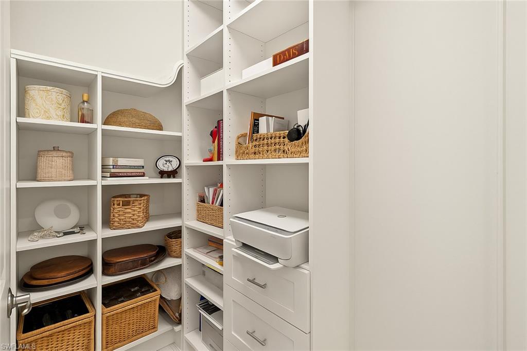 2647 Seychelles Circle, Unit 2203 Naples, FL 34112 - Photo 25 of 32 a view of a walk in closet
