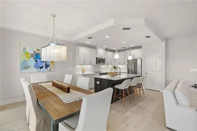 a roof deck with couch and outdoor view