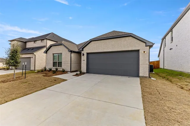 a view of large house with a outdoor space