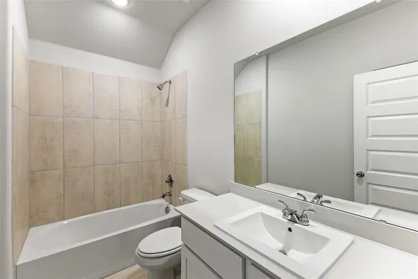 a view of cabinets and wooden floor