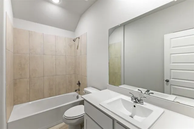 a view of cabinets and wooden floor