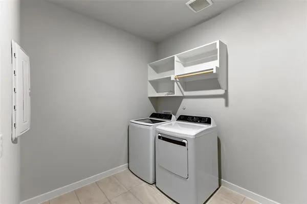 a house with wooden fence