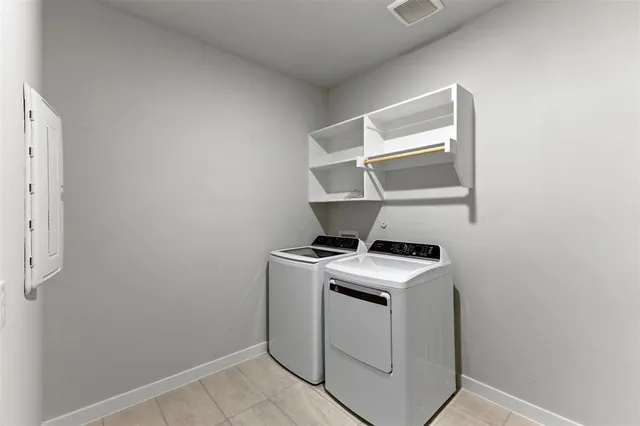 a house with wooden fence