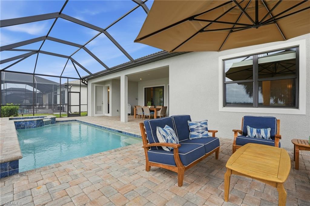 19696 Aqua View Lane Fort Myers, FL 33913 - Photo 38 of 50 a view of a backyard patio and swimming pool