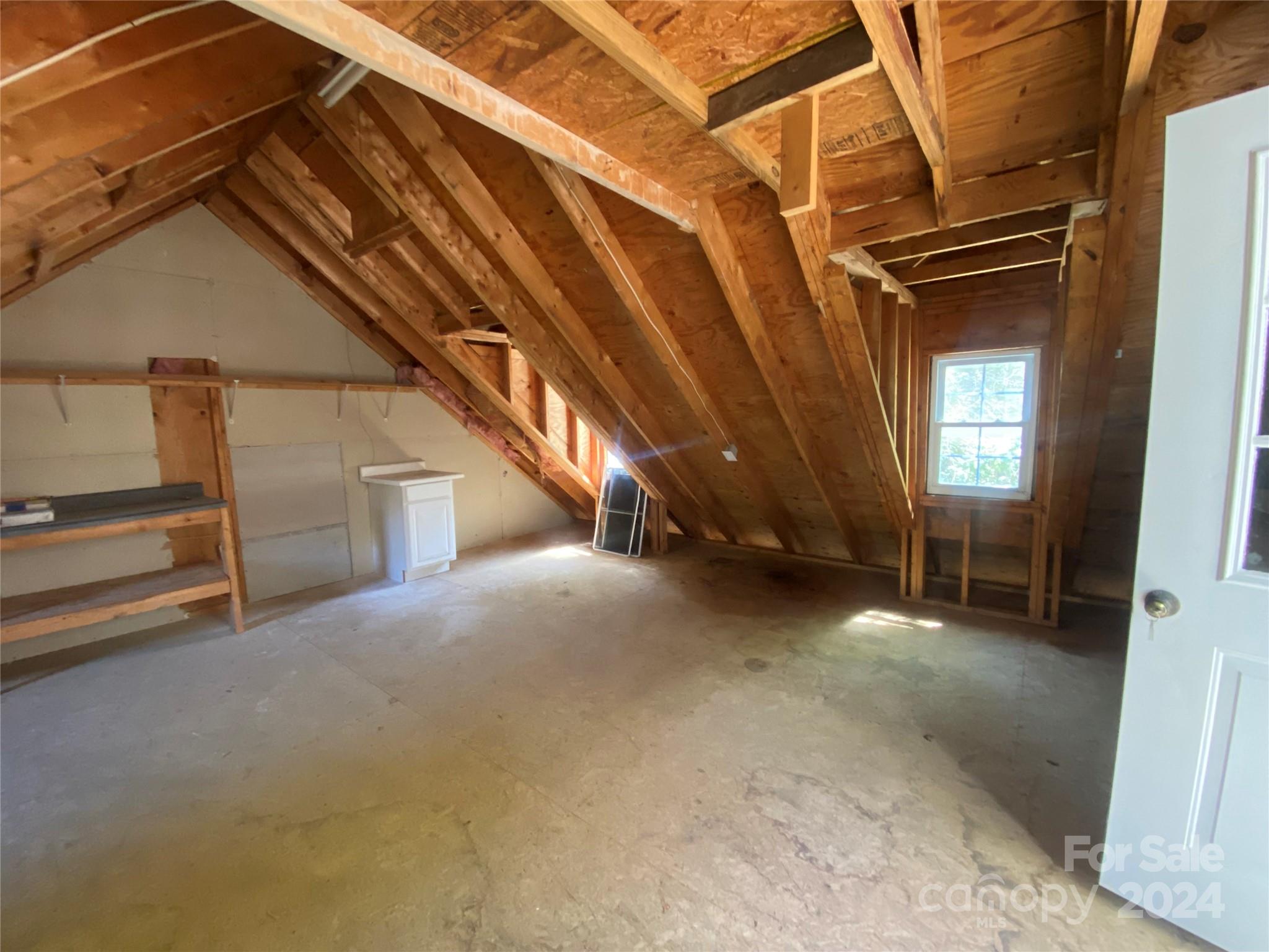 134 Laurel Branch Road Maggie Valley, NC 28751 - Photo 46 of 48 a view of an empty room with stairs