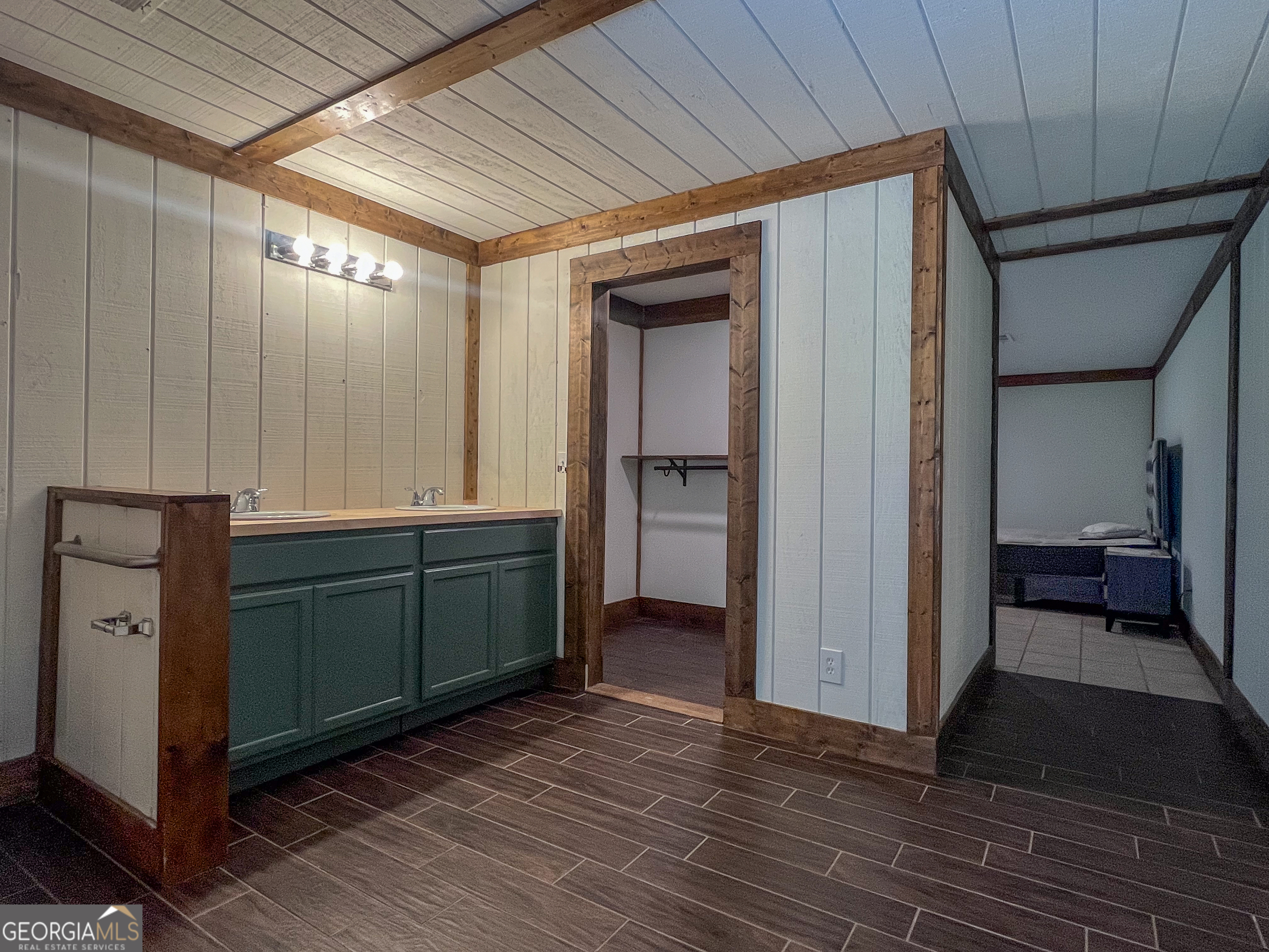 508 Denham Road East Dublin, GA 31027 - Photo 23 of 41 a room with cabinets and wooden floor