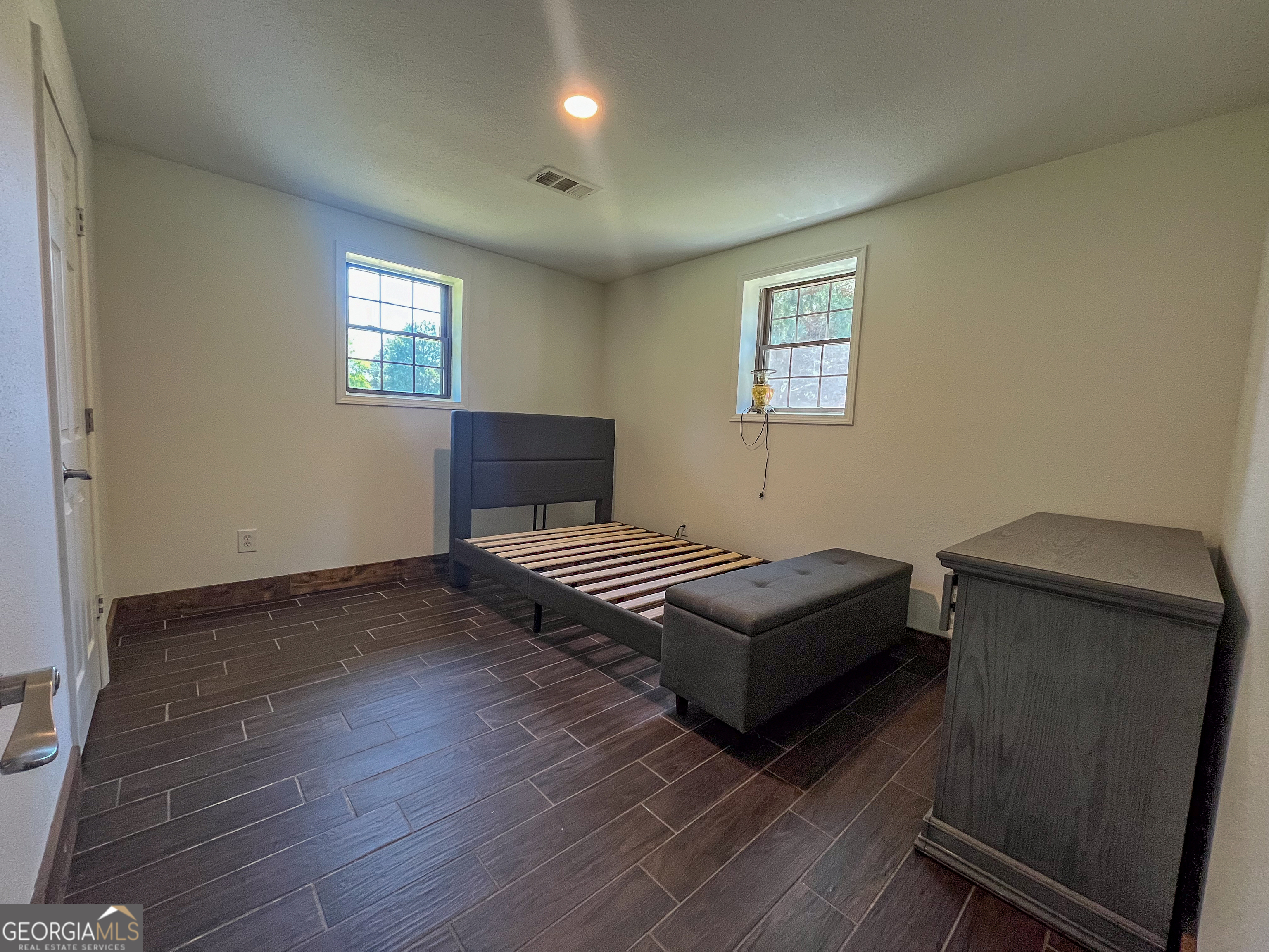 508 Denham Road East Dublin, GA 31027 - Photo 29 of 41 a living room with a bed furniture and a window