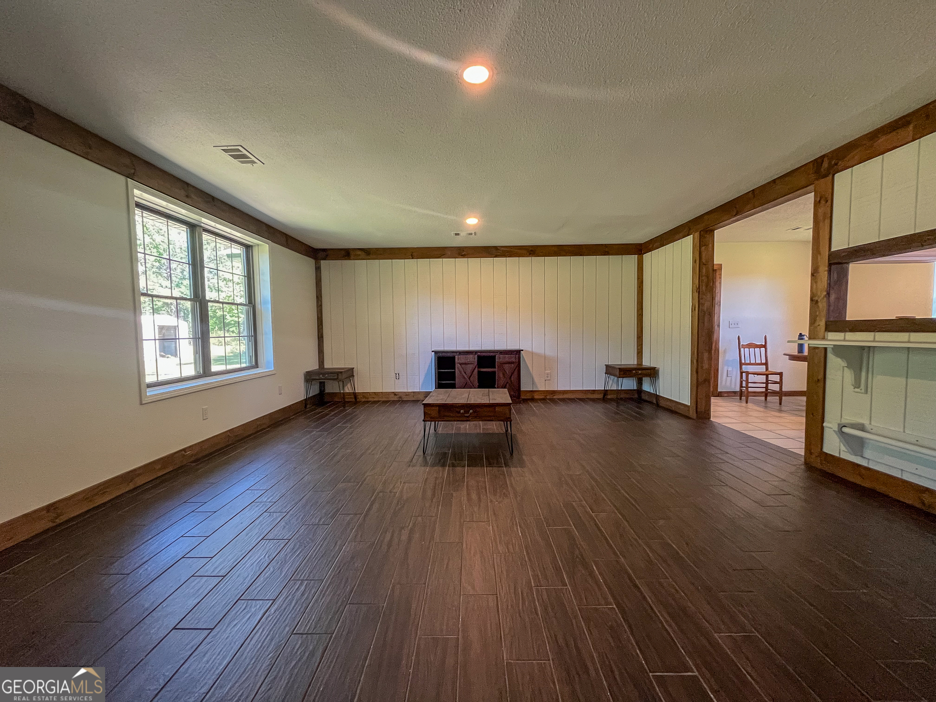 508 Denham Road East Dublin, GA 31027 - Photo 6 of 41 a living room with hardwood floor and a window