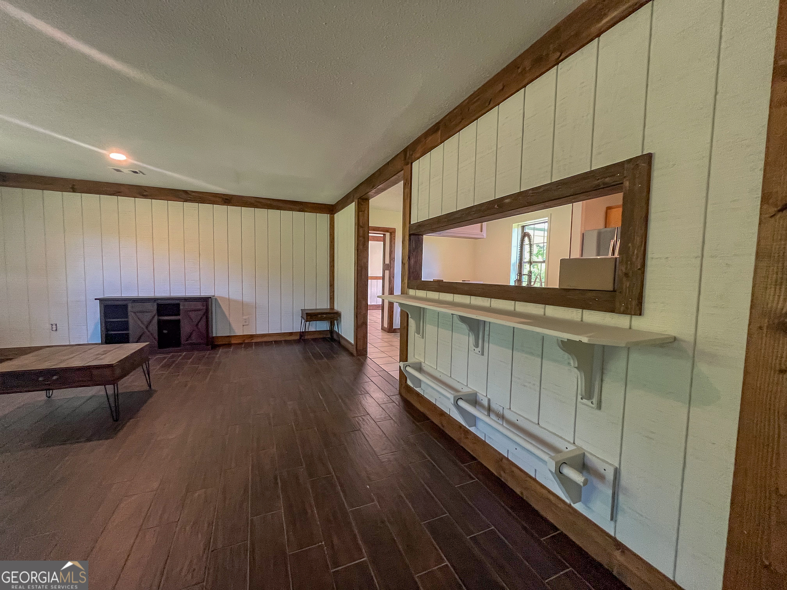 508 Denham Road East Dublin, GA 31027 - Photo 7 of 41 a view of a room with wooden floor and furniture