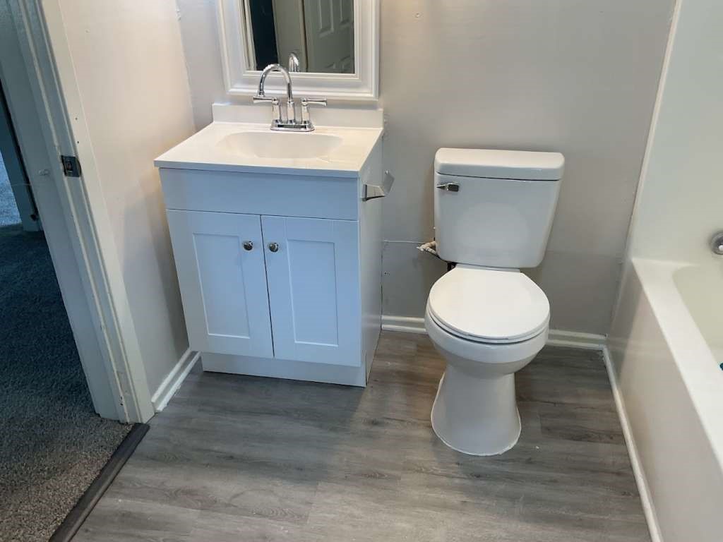 1329 Adams Road Bay City, TX 77414 - Photo 6 of 13 a bathroom with a sink and a toilet